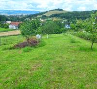 Hilly landscape with a grassy plot for living in Bodovce, Bodovce street, with a view.