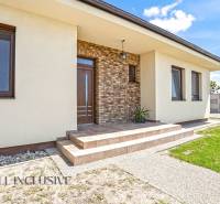 Entrance of a family house on Čečínská Potôň in Horný Potôň with a terrace and staircase.
