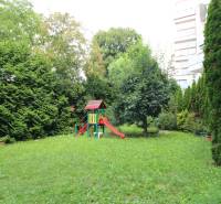 Garden with a children's playground, surrounded by greenery, Bratislava - Dúbravka, Žatevná, commercial premises.