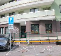 Parking lot in front of commercial premises on Žatevná Street in Bratislava - Dúbravka.