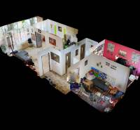 Layout of a 3-room apartment with furnishings, including the kitchen and living room.