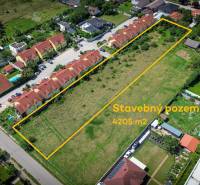 Development plots on Slnečná Street in Miloslavov next to house construction, 4205 m².