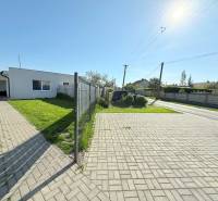 A family house in Košúty with a spacious yard and well-maintained lawn.