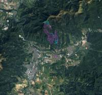 Aerial view of agricultural and forest lands around Sučany.