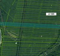 Aerial view of agricultural and forest lands in Topoľovka with parcel numbers.