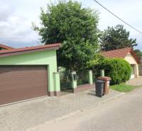 Nové Záhrady VII Street in Bratislava-Ružinov with a family house and garden.
