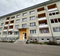 Apartment building in Rimavská Sobota with an entrance gate and balconies.