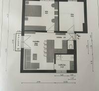 Floor plan of a 3-room apartment with a kitchen, bathroom, toilet, and balcony.