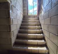 The staircase leading out from the underground spaces of the Lands - housing.