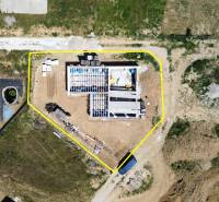 Aerial photograph of a family house under construction in Trenčianske Jastrabie with surroundings and materials.