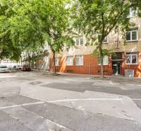 Murgašova Street exterior in Bratislava - Old Town with trees and apartment buildings.