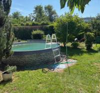 A swimming pool in the garden on Brezová Street, Bratislava - Vrakuňa, Residential plots.