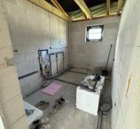 A construction room in a family house with unfinished interior design.