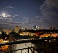 A night panorama from a 2-room apartment on Jégého shows the illuminated Bratislava - Ružinov.