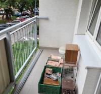 The balcony of a 3-room apartment with a view of the parking lot and Mesačná Street in Bratislava - Ružinov.