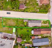 Aerial view of a plot with a family house in the village of Ladce on Pavla Koyša Street.