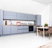 A kitchen in a 3-room apartment with modern furniture and a dining table with three chairs.