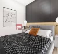 A bedroom in a 2-room apartment with black and white elements and wall decoration.