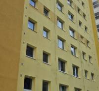 Yellow panel house in Banská Bystrica on Moskovská Street near a 3-room apartment.