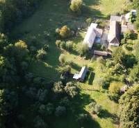 Aerial view of a building, trees, on A.H. Škultétyho Street, residential plots.