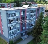 An apartment building in Hnúšťa surrounded by greenery offers 4-room apartments with sunny balconies.