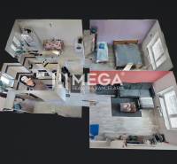 Layout of a 2-room apartment with a living room and kitchen.