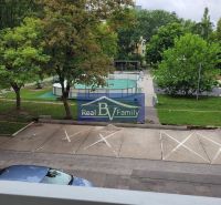 View from a 3-room apartment on Ostredkova Street in Bratislava - Ružinov with a parking lot.