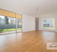 Spacious interior with wood-decor flooring and large windows, Family house.