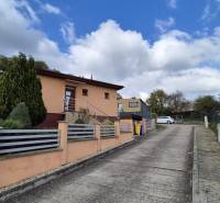 A family house in Ličartovce on Ličartovská Street with a driveway and a garden.