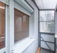 A balcony with glazing in a 3-room apartment, suitable for relaxation and drying laundry.