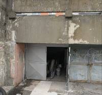 Garages on Dudvážska Street in Bratislava - Podunajské Biskupice, in front of the apartment building.