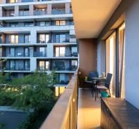 The balcony of a 2-room apartment on Zuzany Chalupovej in Bratislava - Petržalka with a view of the neighboring building.