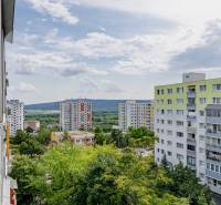 View of apartment buildings and greenery in Bratislava - Karlova Ves, Pribišova, from a 3-room apartment.