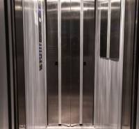 Stainless steel elevator with lighting and mirror in a 4-room apartment.