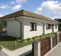 A family house in Gabčíkovo with a terrace and a driveway, surrounded by a garden.