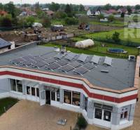 Commercial premises at Štefánikova 267 in Palárikovo with solar panels and a garden.