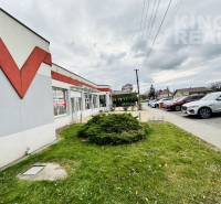 Commercial premises at Štefánikova 267 in Palárikovo with parking and landscaped greenery.