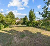The garden at the family house on Senecká Street in Pezinok with fruit trees.