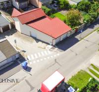 Aerial view of commercial premises in Dunajská Streda with a garden and parking.