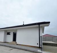 A family house on Veterná Street in Sokolovce with a white facade and a sloped roof.