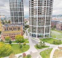 The city garden and high-rise buildings on Bottova Street in Bratislava with extensive greenery.