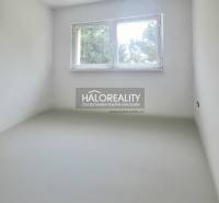 A bright room with a window in a family house, simple walls, Haloreality.