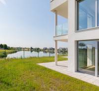Exterior of a 4-room apartment in Kittsee, Am Seepark with a view of the lake.
