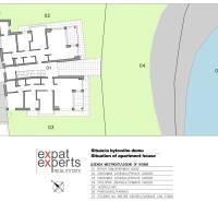 Floor plan of an apartment building with surroundings, including a lake and private gardens in Kittsee, Am Seepark.