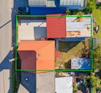 A family house with a red roof and a garden on Sklárska Street in Lednické Rovne.