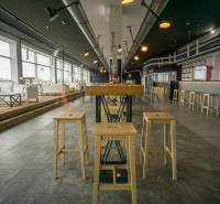 Spacious dining areas with wooden chairs and large windows.
