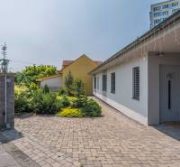 A family house on Janka Matúšku in Bánovce nad Bebravou with a paved courtyard and a garden.