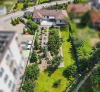 A family house on Janka Matúška Street in Bánovce nad Bebravou with a garden full of greenery.
