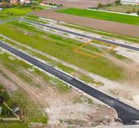 Residential plots in Amadeho Kračany in Kostolné Kračany with an asphalt road.