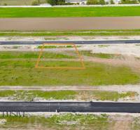 New building plots in Amadeho Kračany for residential purposes in Kostolné Kračany with an asphalt road.